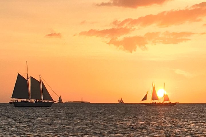 sunset with sailboats