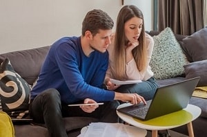 couple looking at online mortgage application